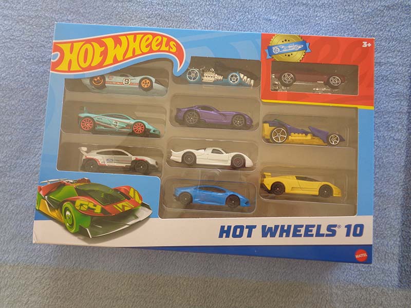 Hot Wheels 10 - Multipack - 10 cars - Scale 1:64 - Ford GT40 light blue as first car and Ford Mustang as special attraction in brick color - Series # 54886